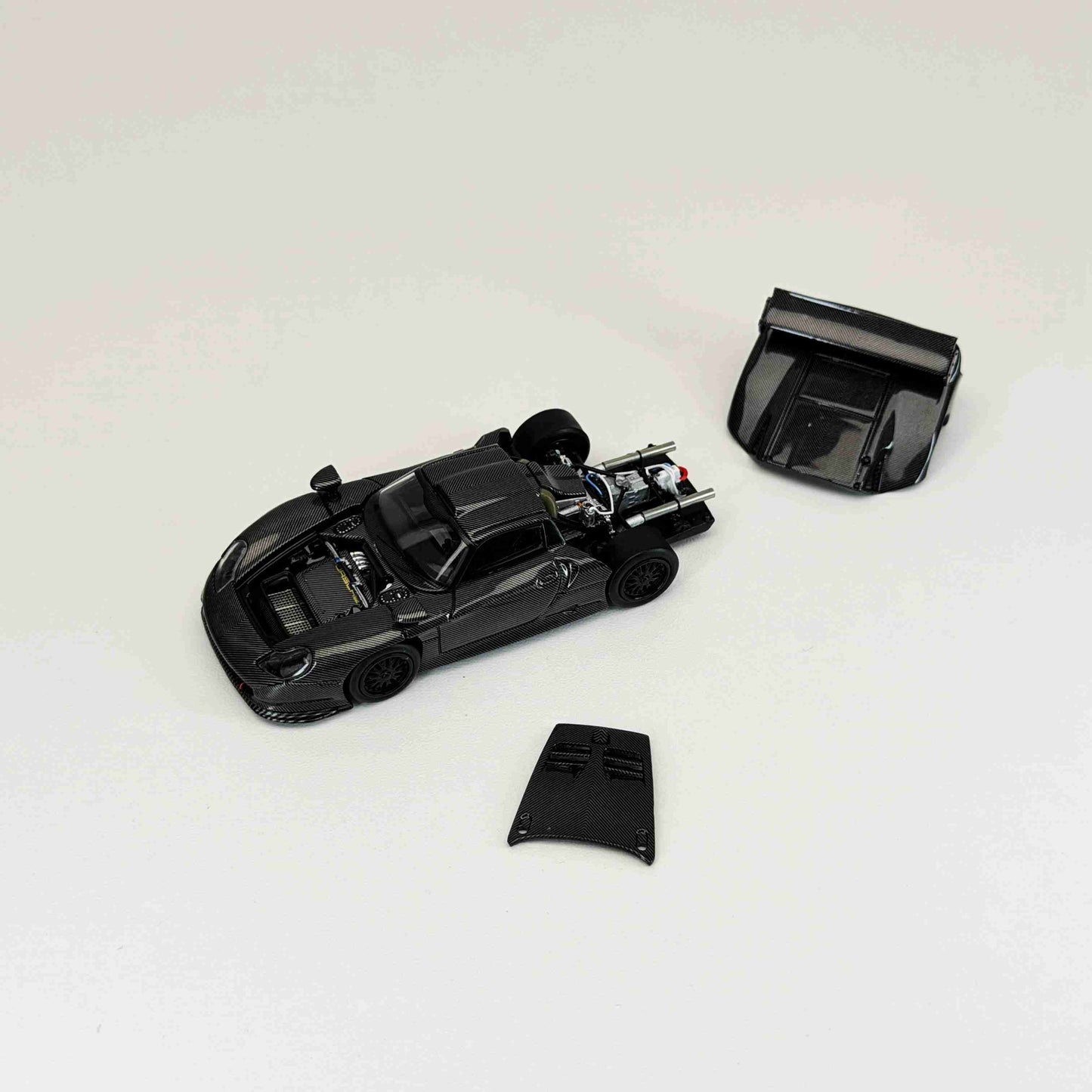 Transcend model 1:64 911 GT1 24h LeMans 1997 Black Carbon Fiber Openable Hood Diecast Model Car Limited Collection